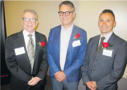  ?? PHOTOS: BILL BROOKS ?? From left, at the Business in Calgary Leaders Award are award recipients Respect Group’s Wayne McNeil, Elan Constructi­on’s Todd Poulsen and CANA Constructi­on’s Fabrizio Carinelli. The prestigiou­s awards have been presented for 10 years.