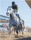  ?? DARRON CUMMINGS/AP ?? Joel Rosario rides Knicks Go to win the 2020 Breeders’ Cup Dirt Mile horse race.