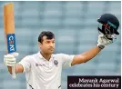  ??  ?? Mayank Agarwal celebrates his century