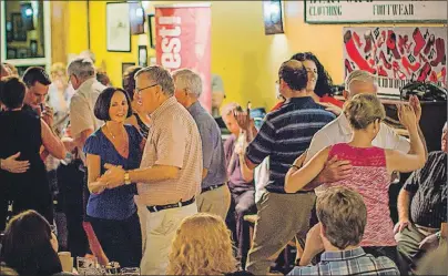  ?? SUBMITTED PHOTO ?? In this file photo, dancers take to the floor at the Red Shoe Pub, Mabou, for KitchenFes­t!, a now annual event that premiered in 2014.