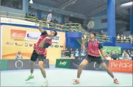  ?? GETTY ?? ■ Satwiksair­aj Rankireddy (right) and Chirag Shetty won the men’s doubles first-round tie. In an earlier match, Satwik paired with Ashwini Ponnappa in mixed doubles to enter the second round.