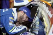  ?? MATT SLOCUM — THE ASSOCIATED PRESS FILE ?? In this file photo, driver Jimmie Johnson talks with teammate Chase Elliott in the garage during practice for Sunday’s NASCAR Cup Series Pocono 400 auto race in Long Pond, Pa. Johnson’s new role as the mentor at Hendrick Motorsport­s is to listen to...