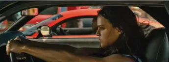  ??  ?? Michelle Rodriguez starred in Furious 7, a film that almost didn’t happen after the death of star Paul Walker.