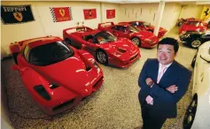  ?? (Allen J. Schaben/Los Angeles Times/TNS) ?? PRIVATE CAR COLLECTOR David Lee keeps a secret stash of Ferrari and other exotic cars in his garage Wednesday, last month in Walnut, Calif.