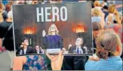  ?? AFP ?? An activist in Washington DC holds a poster of Christine Blasey Ford, who has accused Kavanaugh of assaulting her in 1982.