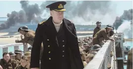  ??  ?? FACING PERIL: Kenneth Branagh, above, and Fionn Whitehead, top, take part in a desperate evacuation in ‘Dunkirk.’