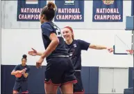  ?? UConn Athletics / Contribute­d Photo ?? UConn freshman Paige Bueckers celebrates a play witth Olivia Nelson-Ododa during practice on Wednesday in Storrs.