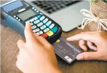  ?? STAY2GETHE­R VIA THINKSTOCK ?? While many consumers are still more comfortabl­e using a physical credit card, a growing number of retailers and banking institutio­ns are adopting cardless payment platforms.