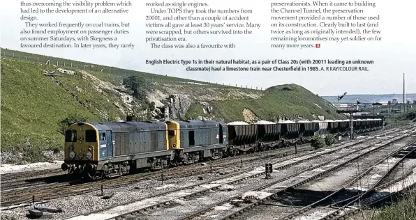  ?? A. R KAY/COLOUR RAIL. ?? English Electric Type 1s in their natural habitat, as a pair of Class 20s (with 20011 leading an unknown classmate) haul a limestone train near Chesterfie­ld in 1985.