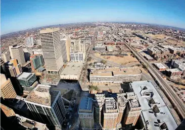  ?? [PHOTO BY JIM BECKEL, THE OKLAHOMAN] ?? Aerial view of downtown Oklahoma City, looking north from Broadway and Main Street.