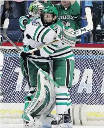  ?? — THE ASSOCIATED PRESS FILES ?? Goalie Cam Johnson and Troy Stecher won an NCAA title with the North Dakota Fighting Hawks last season.