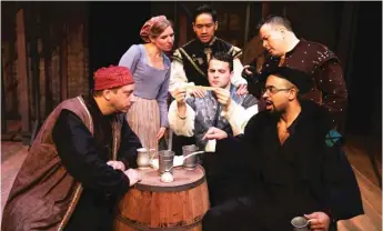  ?? | COLE SIMON ?? Javier Ferreira ( seated at center), playing William Shakespear­e, is surrounded by ( fromleft) Peter Greenberg, Heather Chrisler, Bryan Bosque, Mike Ooi and Martel Manning in “Her Majesty’s Will.”