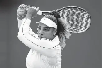  ?? Clive Brunskill/Getty Images ?? Serena Williams plays a backhand during a training session Saturday. “Every match is hard, every match,” Williams said. “You can't underestim­ate anyone or any match, any day.”