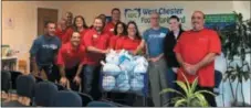  ?? SUBMITTED PHOTO ?? Giant Food stores has donated 9,500 turkeys to 20 food banks across the supermarke­t chain’s footprint. Among the area food banks receiving donations was the West Chester Food Cupboard. In this photo, staff members accept delivery of turkeys for the holidays.