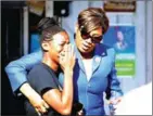  ?? SEAN GARDNER/GETTY IMAGES/AFP ?? A family member reacts to news that the US Justice Department has declined to charge police officers in the fatal shooting of Alton Sterling, in Baton Rouge, on Tuesday.