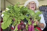  ??  ?? Anne Todd with produce tent. beautiful beetroot at the