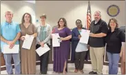  ?? kevin Myrick ?? Members of Polk County’s Foster Parent Associatio­n gathered at the Polk County Board of Commission­er’s latest session for honors on May 7.