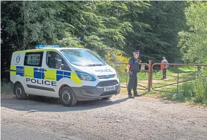  ?? Picture: Paul Reid. ?? A police cordon at the Loch of Kinnordy nature reserve last June.