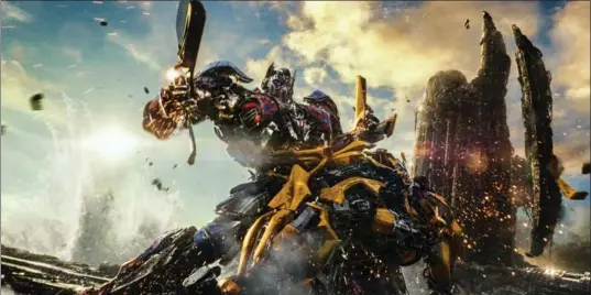  ?? , PARAMOUNT PICTURES ?? Optimus Prime and Bumblebee in "Transforme­rs: The Last Knight."