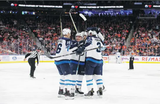  ?? THE CANADIAN PRESS/JASON FRANSON ?? The Winnipeg Jets appear to be a lock to make the playoffs, while the Toronto Maple Leafs’ chances look good at the halfway point of the NHL season.