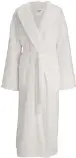  ??  ?? Add a touch of hotel chic and leave this unisex white hooded dressing gown, £75 from The White Company, in a guest’s room