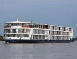  ??  ?? The Amadora has room for 124 passengers as it cruises down the Mekong River.