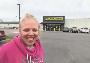  ?? RICK ROMELL / MILWAUKEE JOURNAL SENTINEL ?? Lifelong Manawa resident Heather Sprenger has shifted much of her occasional food shopping from the city’s independen­t grocery store to the recently opened Dollar General.