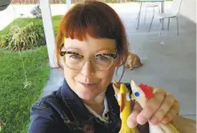  ?? Melissa Jean Footlick ?? Melissa Jean Footlick of San Diego purchased these rubber chickens online, helping ecommerce sites boost their sales.