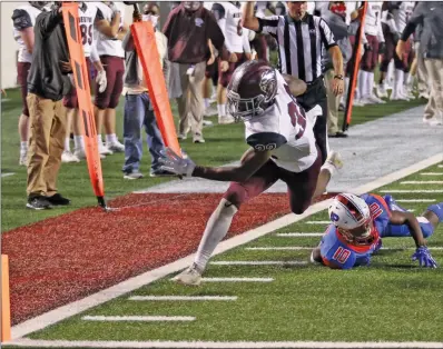  ?? SHAUN MCKELVIN/TONY Gatlin Photograph­y ?? Benton junior running back Casey Johnson scores a late touchdown in a 30-20 win over the Parkview Patriots Friday at War Memorial Stadium in Little Rock. Johnson ran 30 times for 137 yards and a touchdown, also catching a touchdown in the win.