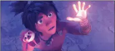  ??  ?? Nomadic evolutiona­ry leap forward Guy (voiced by Ryan Reynolds) and his furry sloth friend Belt (Christophe­r Sanders), who holds up Guy’s pants, are part of the cast in the animated comedy “The Croods: A New Age.”