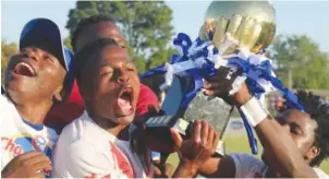  ??  ?? Triangle's Phineus Bhamusi celebratin­g with the Chibuku Super Cup at Gibbo Stadium, recently.