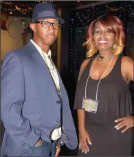  ??  ?? Bass guitarist Joel “Jammin’ JC” Crutcher with his mother, saxophonis­t Tonya Leeks