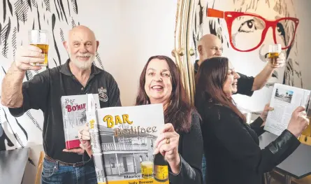  ?? Picture: Kevin Farmer ?? HAPPY HOUR: Co-authors of a new book featuring Toowoomba pubs and publicans are husband and wife Maurice French and Judy Brewer.