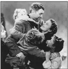  ??  ?? James Stewart and Donna Reed portray George and Mary Bailey in “It’s a Wonderful Life.”