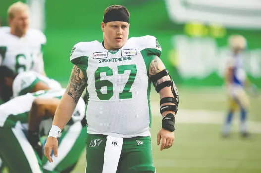  ?? TROY FLEECE ?? Coming off his first all-star season, Saskatchew­an Roughrider­s centre Dan Clark has rejected free agency and signed a two-year extension with the Green and White.