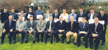  ?? ?? Fermoy students (back row) who were presented with awards by the Minister for Agricultur­e, Food and Rural Developmen­t, Joe Walsh TD, at the Blarney Park Hotel, Cork in 2002, with front row, l-r: Derry McCarthy (ACC Bank), Patsy Myers (Bank of Ireland, Fermoy), Bill Cahill (FBD Insurance), Padraig McEoin (FETAC), Jerry McCarthy (CAO, Teagasc), Joe Walsh (Minister for Agricultur­e, Food and Rural Developmen­t), Paddy Browne (Head of Education, Teagasc), David White (Education Officer, Teagasc) and Brendan Cotter (Fermoy Credit Union).