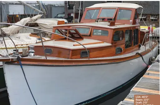  ??  ?? (Top) The cruiser flaunts her stunning brightwork at the dock. (Bottom) Her nameplate is a remnant of her origin. LOA: 46'0" Beam: 11'0" Draft: 3'0" Displ: 26,000 lb. Fuel: 160 gal. Water: 30 gal. Power: 2/300-hp Ford gas inboards Cruise speed: 10...