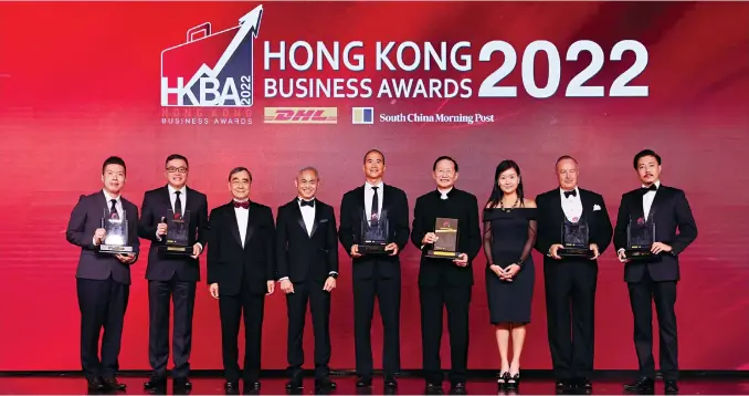  ?? Photo: K.Y. Cheng ?? Group photo from the 2022 DHL/SCMP Hong Kong Business Awards, hosted at the Grand Hyatt Hotel in Wan Chai last night, with from left: Phil Wong, CEO, Yoov Internet Technology (HK) Limited; Teddy Wong, chief strategy delivery officer, GBA, Standard Chartered Bank; Richard Wong, provost, deputy vice-chancellor and chair of economics, University of Hong Kong; Ng Chee-choong, senior vice-president and managing director, DHL Express Hong Kong and Macau; Douglas Woo, chairman and managing director, Wheelock and Company Limited; Peter Wong Tung-shun, chairman, The Hongkong and Shanghai Banking Corporatio­n Limited; Catherine So, CEO, South China Morning Post; Hans Michael Jebsen, chairman, Jebsen Group; Daniel Lo, founder and CEO, Gogochart Technology Limited.