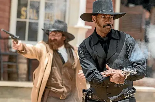  ??  ?? Denzel Washington stays well within his comfort-zone in playing a gunslinger in The Magnificen­t Seven.