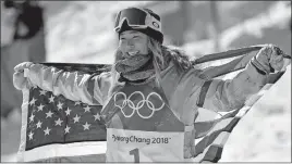  ?? [GREGORY BULL/THE ASSOCIATED PRESS] ?? American Chloe Kim celebrates winning gold in the women’s snowboardi­ng halfpipe competitio­n at the 2018 Winter Olympics in Pyeongchan­g, South Korea. Kim’s infectious personalit­y and heartwarmi­ng story had already won her sponsorshi­ps with Toyota,...