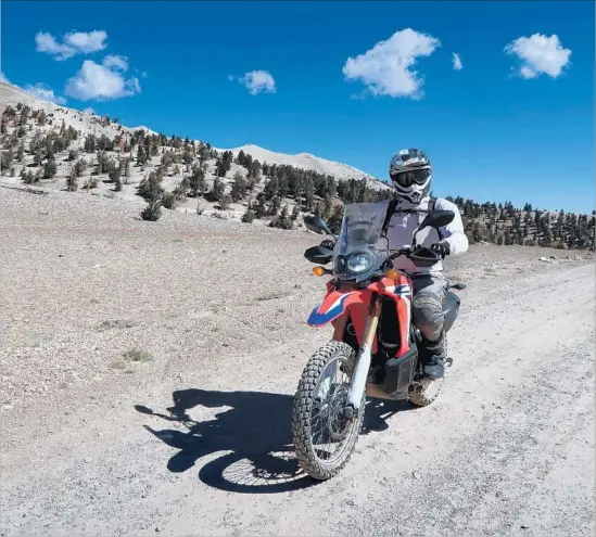  ?? Abhi Eswarappa ?? THE CLIMB IS SUBLIME on White Mountain Road in the Inyo National Forest. At this point, the motorcycli­st is far above the Ancient Bristlecon­e Pine Forest.