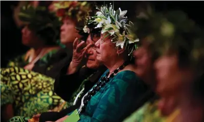  ?? Photograph: Fiona Goodall/Getty Images ?? Guests listen as New Zealand prime minister Jacinda Ardern apologises to Pacific people for the ‘dawn raids’ of the 1970s.