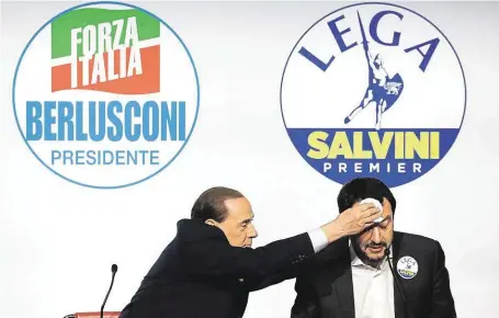  ?? Matador italské politiky a šéf strany Vzhůru, Itálie Silvio Berlusconi otírá pot z čela lídrovi Ligy severu Matteovi Salvinimu. FOTO REUTERS ?? Povstal z popela.