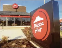  ?? MARK FISHER / STAFF ?? Pizza Hut’s footprint has expanded locally over the past year with new stores in Kettering, Beavercree­k and Dayton.