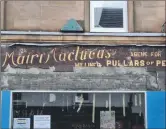  ?? ?? Some of the original signage above Nories chip shop.