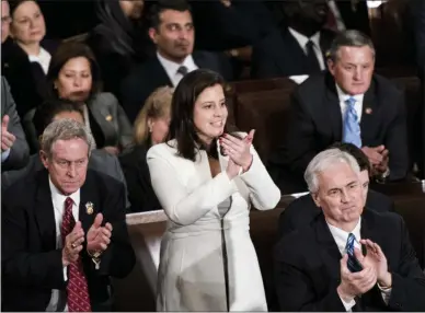  ?? AP FILE ?? House Republican­s including Rep. Elise Stefanik, R-Schuylervi­lle, stand and applaud during President Donald Trump’s State of the Union Address to a joint session of Congress in the Capitol on Tuesday, Feb. 5, 2019.
