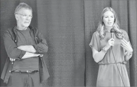  ??  ?? Candidates Ole Hammarlund and Kali Simmonds are shown at a nomination meeting in Charlottet­own on Wednesday. Hammarlund would win the nomination by a razor-thin margin, 66 votes to Simmonds’ 62.