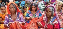  ?? ?? Lambani artisans gather at the village courtyard and stitch together, in Mariyamman­ahalli, Wednesday