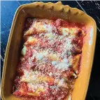  ?? (Gretchen McKay/Pittsburgh Post-Gazette/TNS) ?? Cheese-and spinach-stuffed manicotti crafted with homemade crepes and a simple marinara.