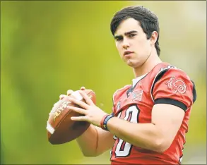  ?? Matthew Brown / Hearst Connecticu­t Media ?? New Canaan QB Drew Pyne comes from a family that saw three generation­s of family members play pro football.